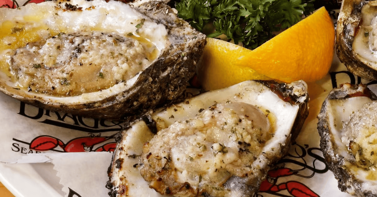 GroupSync | New Orleans for Group Travel | Plate of Charbroiled Oysters from Drago's Seafood Restaurant