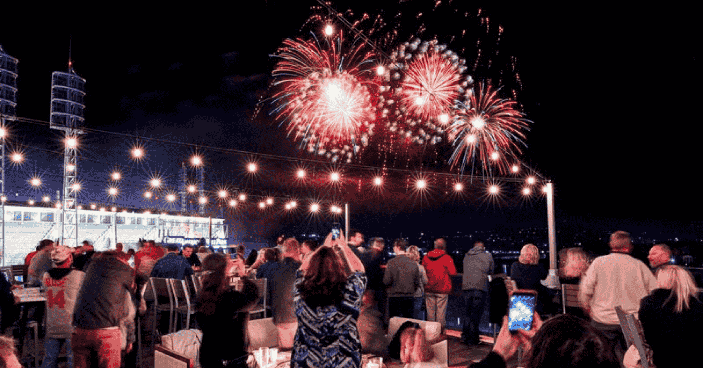 Fireworks over Cincinnati Reds Great American Ball Park from the rooftop of the AC Hotel Cincinnati at The Banks