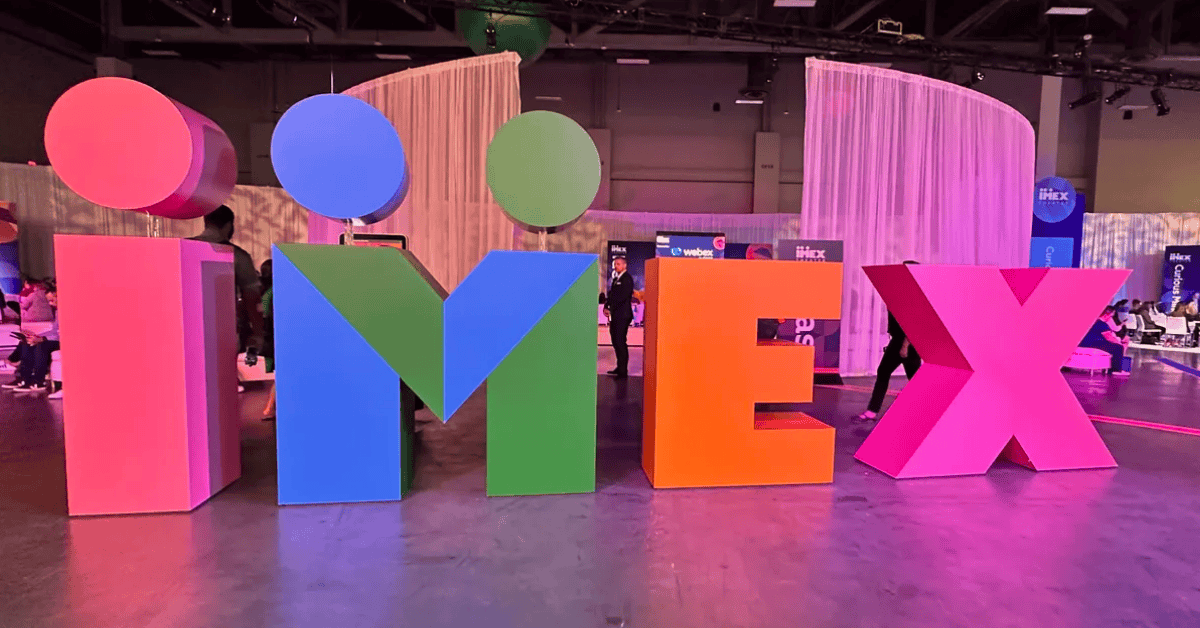 Oversized IMEX sculpture in bright colors at a show