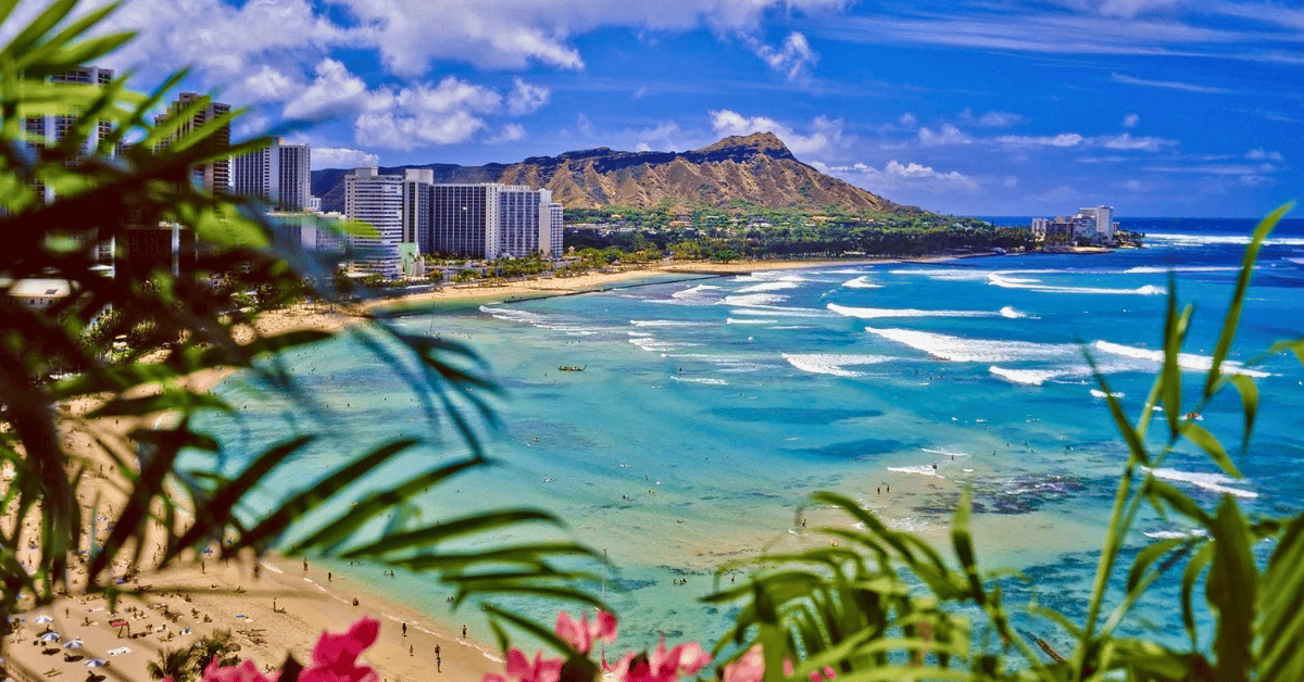 Tropical beach with blue waters in Honolulu, Hawaii