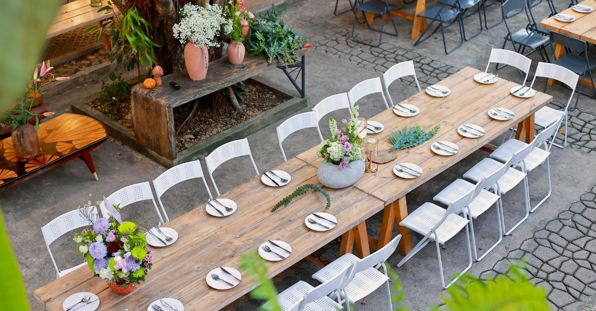 overhead view of sustainable eco-friendly event re-usable table setting and natural decor