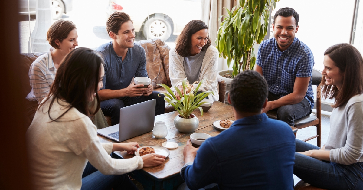 third places group of young professional having coffee in event space casual meeting area