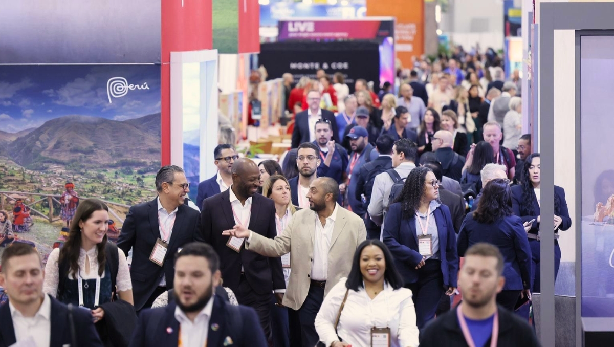 IMEX 2026 IMEX event floor filled with event attendees surrounded by booths